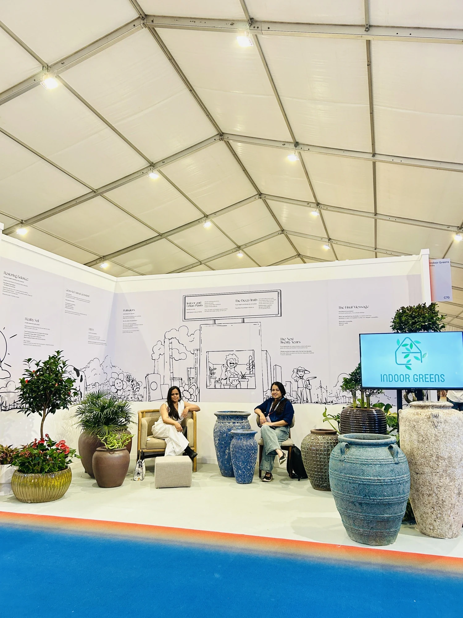 A glimpse of our stall at the event — a curation of our finest ceramic planters and select specimen plants, styled with seating from Wootique.